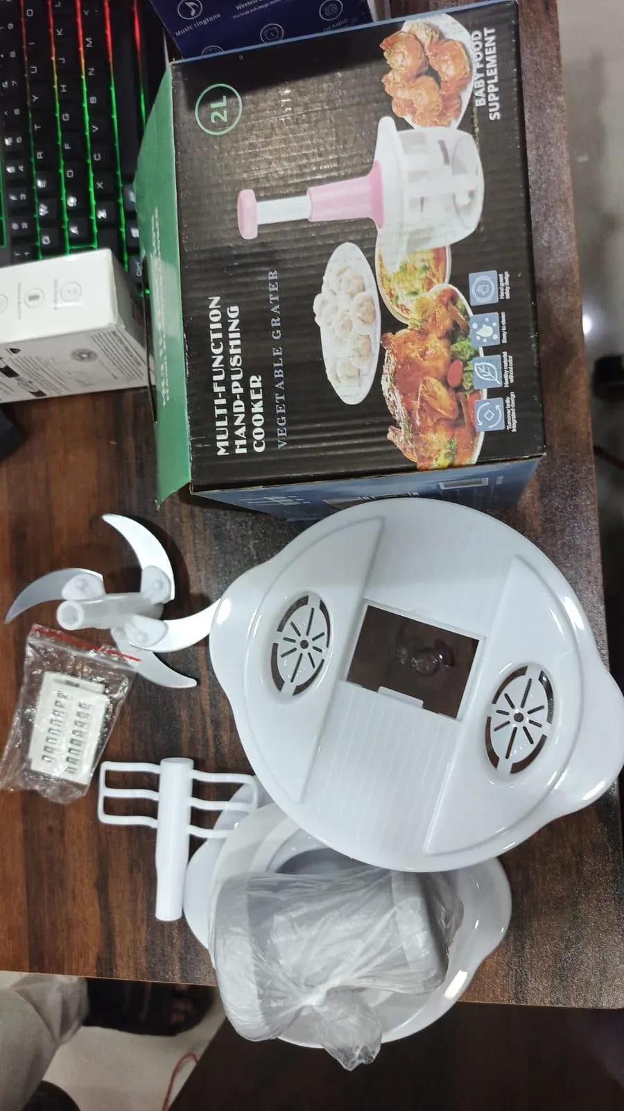 "9-in-1 Vegetable Chopper 2000ML" ya "Manual Push Chopper"